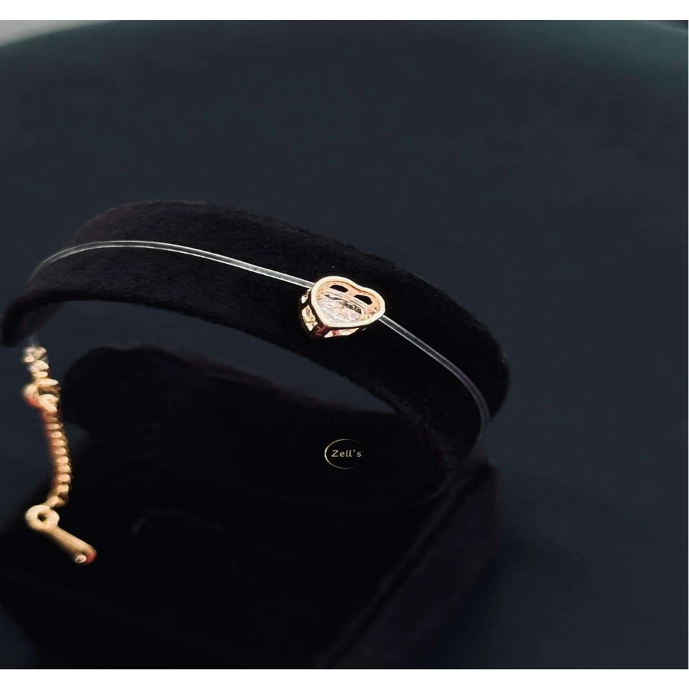 Zell’s Transparent Wire Bracelet with Rose Gold Heart Charm