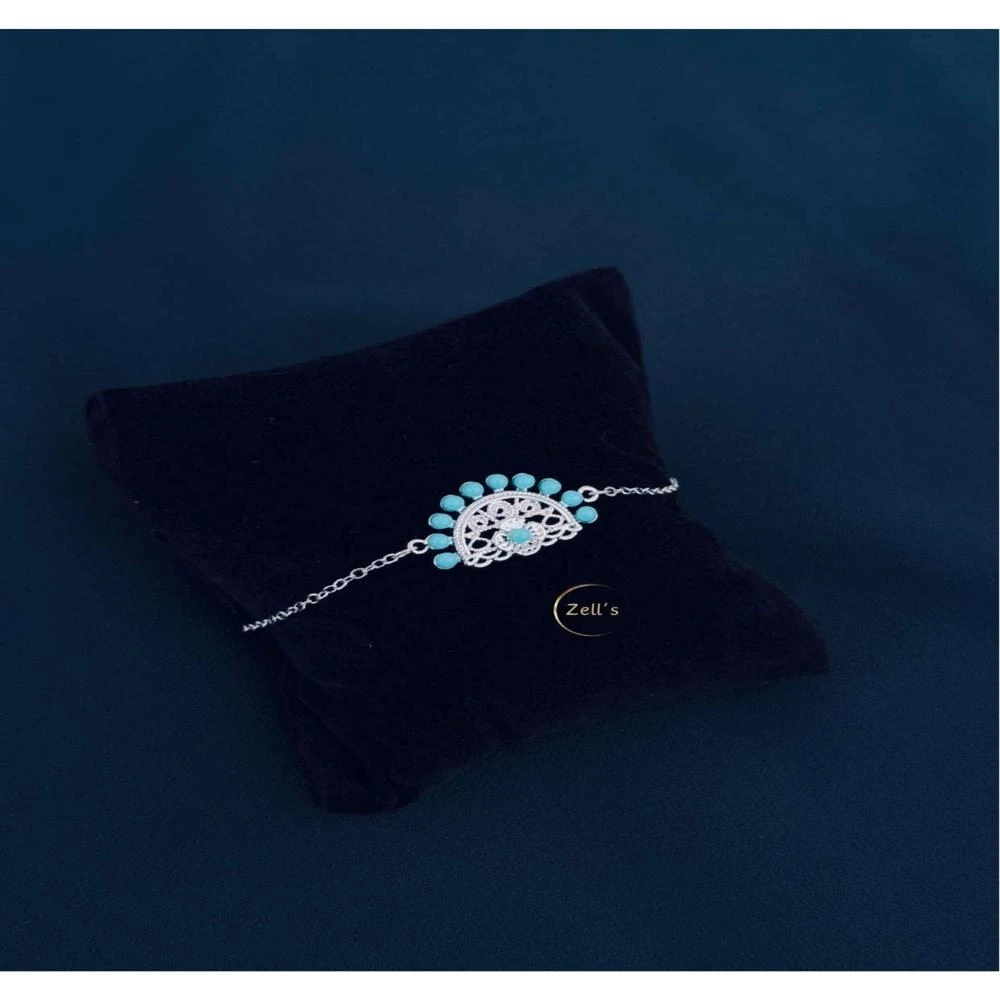Zell’s Turquoise Filigree Charm Bracelet – Silver and Blue Elegance