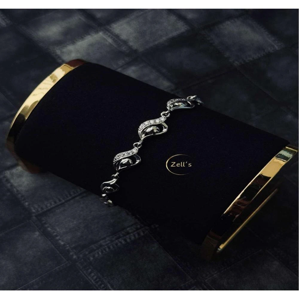 Zell’s Silver Wave Crystal Link Bracelet – Elegant Curved Design
