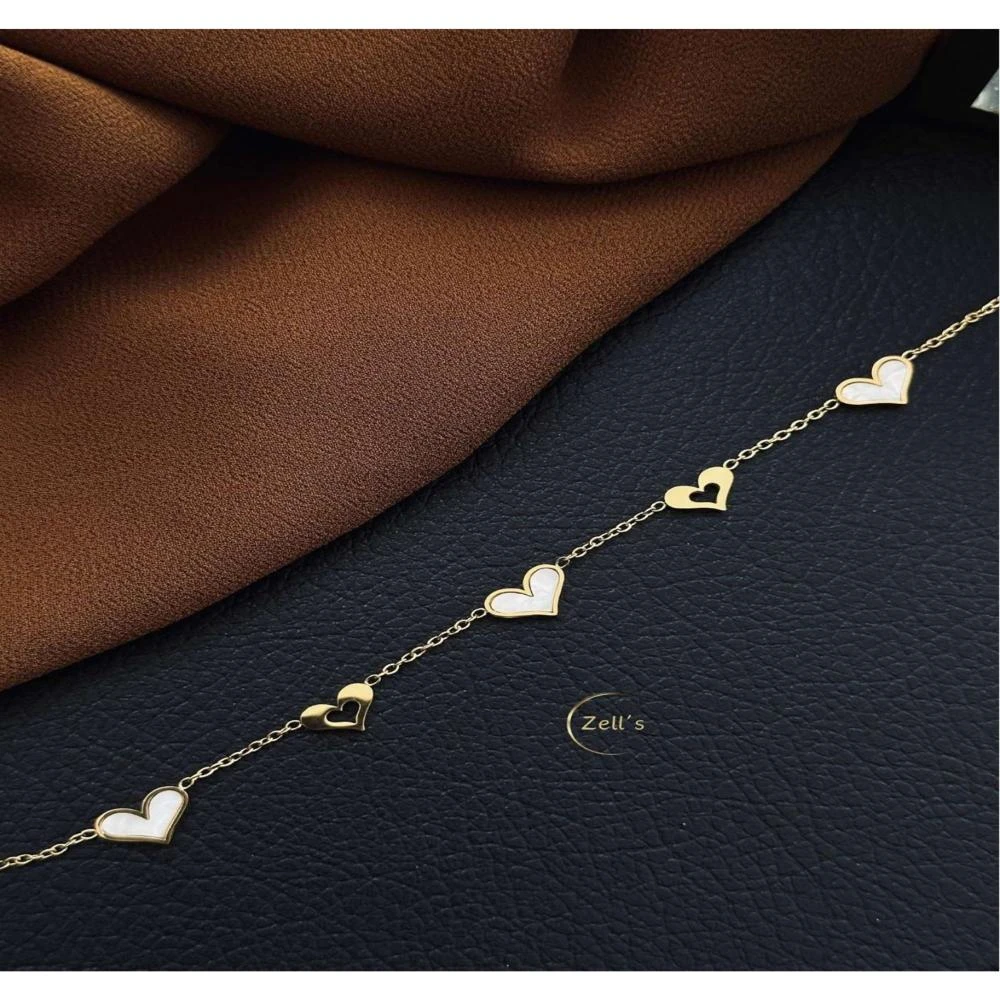 Zell’s White & Hollow Heart Link Bracelet – Gold Chain Elegance